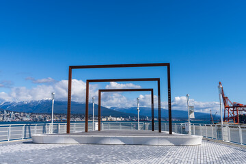 Vancouver Seawall, Canada Place, the cruise ship terminal and convention center. Vancouver, BC, Canada.