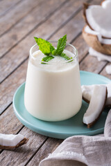 Healthy vegan coconut indian lassi on a table