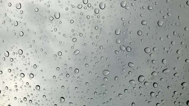 rain water drops on the window glass texture.