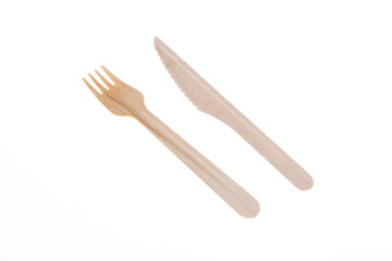 wooden fork and knife made from recycled paper or wood