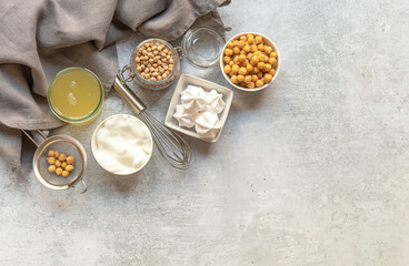 Vegan cooking concept. Meringue from canned chickpea water aquafaba. Healthy product. Eggs replacement and substitute. Top view, copy space for recipes.