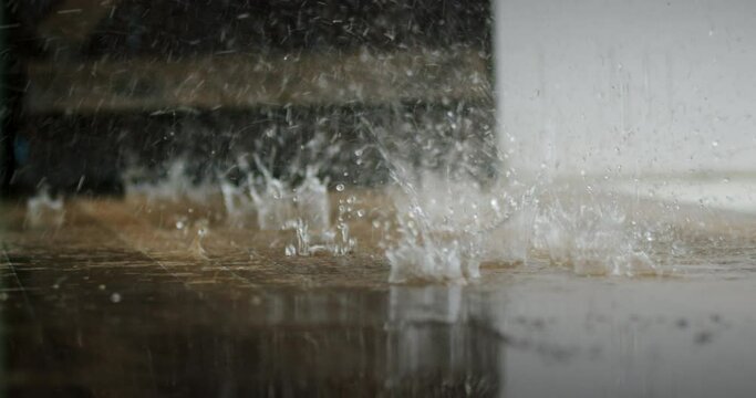 Rain water drop falling to the floor.