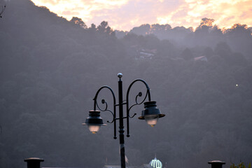 Beautiful picture of black road side lamp in india. Background Blur