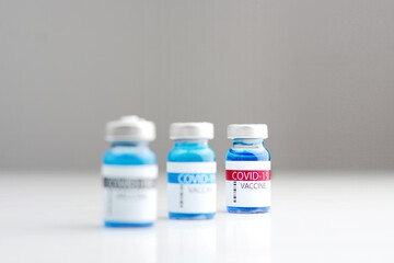 Three Coronavirus vaccine bottle.Vaccination covid-19, medical research and development concept. 