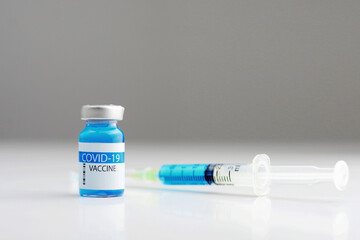 Coronavirus vaccine bottle with Sryinge.Vaccination covid-19, medical research and development concept. 
