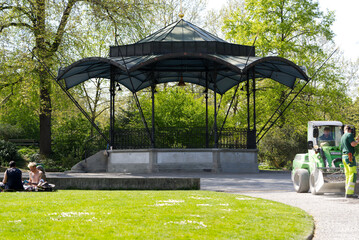 Pavilion at Platzspitz park with sitting and working people at a beautiful spring day. Photo taken...
