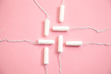 Obraz na płótnie Canvas Menstrual tampon on a pink background.