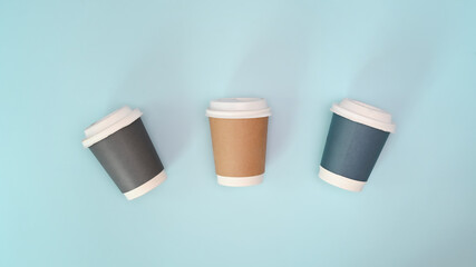 Real photo paper cup take away eco friendly on blue background.