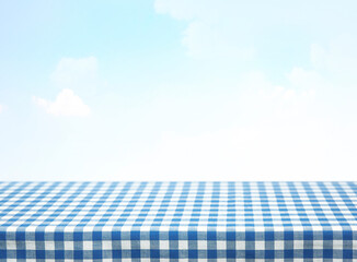 Blue checkered tablecloth empty advertisement space. Food promotion table.Product display.