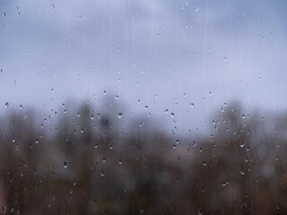 raindrops on window glass, autumn season
