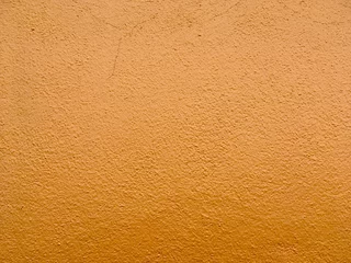 Fotobehang orange texture of the wall © Nontthepcool