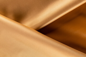 draped surface of eco-leather for caramel-colored garments