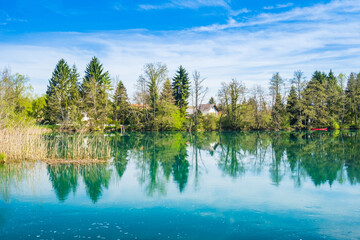 Fototapeta na wymiar River of Mreznica in Croatia, trees reflection on water