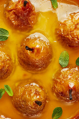 pie with baked whole pear close-up top view