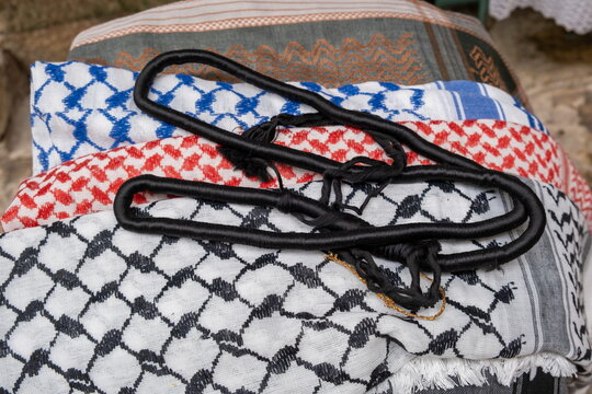 Set of arab scarf shawl keffiyeh or kafiya and Igal or Agal for sale at Jerusalem Old Town market