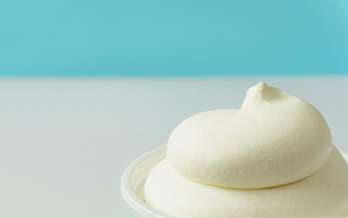 Fototapeta na wymiar A cup of vanilla ice cream. soft serve ice cream. カップのアイスクリーム。ソフトクリーム