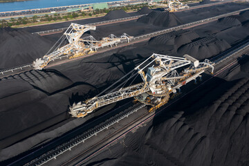 Bulk coal scoop conveyors and coal stockpiles, Port of Newcastle, NSW, Australia.