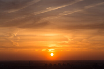 Fototapeta na wymiar Beautiful golden sunset over the city, panoramic view