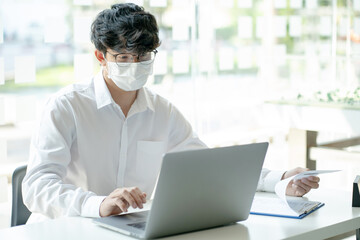 Coronavirus. Business workers wearing protective mask.