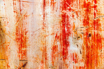 傷と錆と塗料の剥がれた鉄板の表面