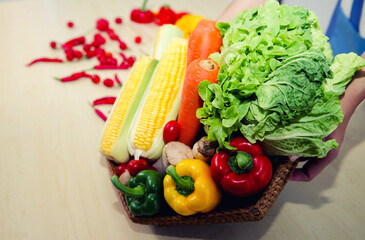 Chef cuts the vegetables into a meal. Preparing dishes. A woman uses a knife and cooks.