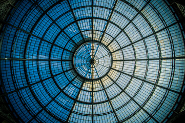 Abstract circular pattern of the glass dome of the Galleria Vittorio Emanuele II in Milan, Lombardy, Italy.