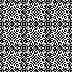 seamless tile with abstract ornaments in folk style drawn on a white background, vector