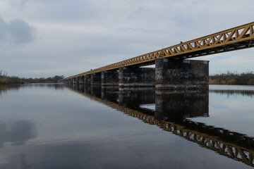 Old abandoned train railway bridge moerputtenbrug in The Netherlands