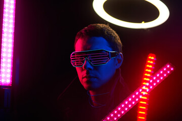 Cyberpunk style portrait of man in futuristic costume.