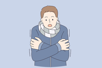 Obraz premium Feeling cold and frozen concept. Young man in warm coat and scarf standing feeling cold with surprised look vector illustration 