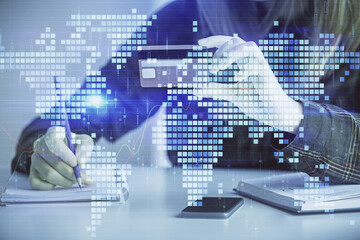 Multi exposure of woman on-line shopping holding a credit card and financial theme drawing. Business E-commerce concept.