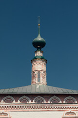 Fototapeta na wymiar Top of the ancient Russian church.