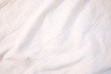 Obraz premium Fabric backdrop White linen canvas crumpled natural cotton fabric Natural handmade linen top view background Organic Eco textiles White Fabric texture