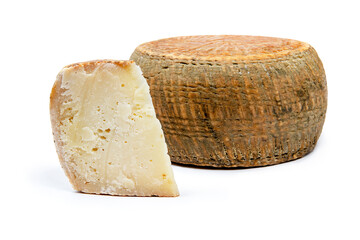 a piece of aged pecorino cheese with cheese wheel in white background