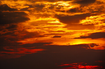 Beautiful sunset sky, yellow clouds