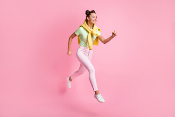 Full size profile side photo of dreamy cute woman jump up run empty space sale wear tight jumper isolated on pink color background