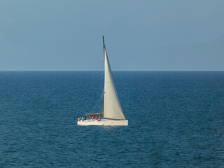 Fototapeta premium Sailing boat sailing on a calm sea