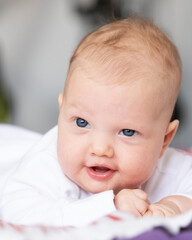 Sly looking newborn baby portrait