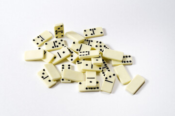 Scattered dominoes on a white background