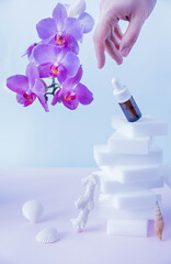 bottle with cosmetics and a mirror. levitating serum bottle on a white podium with seashells and corals. mirror in the shape of a heart and a bottle with cosmetics