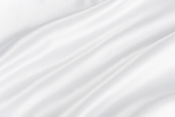 Fototapeta premium Abstract white silk fabric texture background. Cloth soft wave. Creases of satin