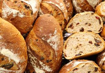 Heap of delectable raisin and walnut whole wheat Breads