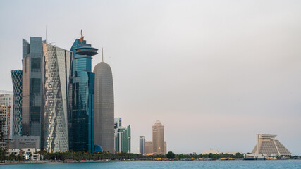 Colorful Skyline of Doha Qatar City during night during summer.