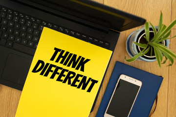 Text sign showing Think Different