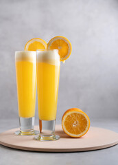 Refreshing freshly made fruit juice on a glass , Fresh Orange juice