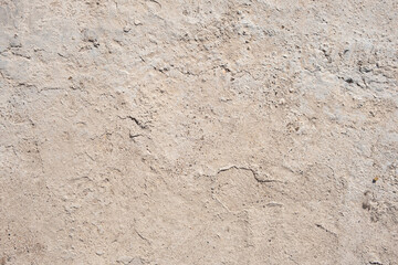 Concrete gray background, top view. flawed cement screed