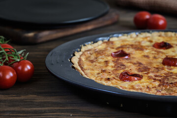 Kish Lauren with smoked meat and cheese in a baking dish