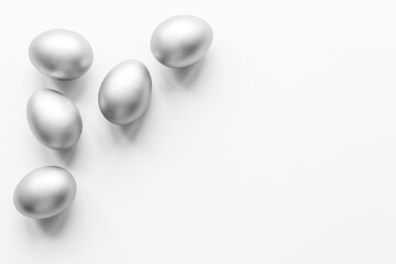 Silver eggs isolated on white background. Easter decoration background. Top view