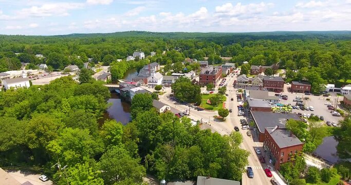 Milford town center aerial view on Souhegan River, Milford Oval and Union Square in town of Milford, New Hampshire NH, USA. 