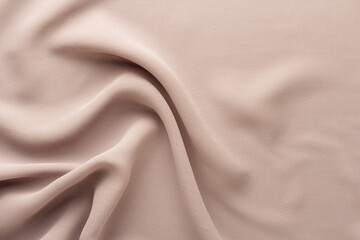 flesh-colored fabric draped with large folds, textile background